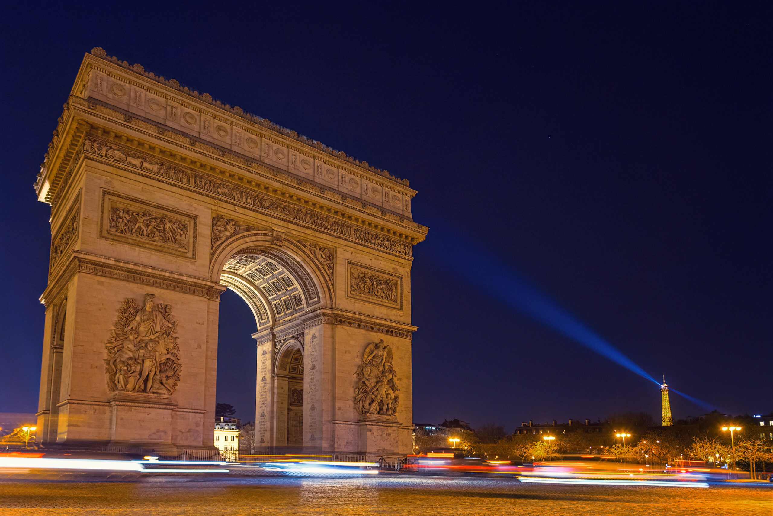 time lapse photography of Arch de Triumph at night